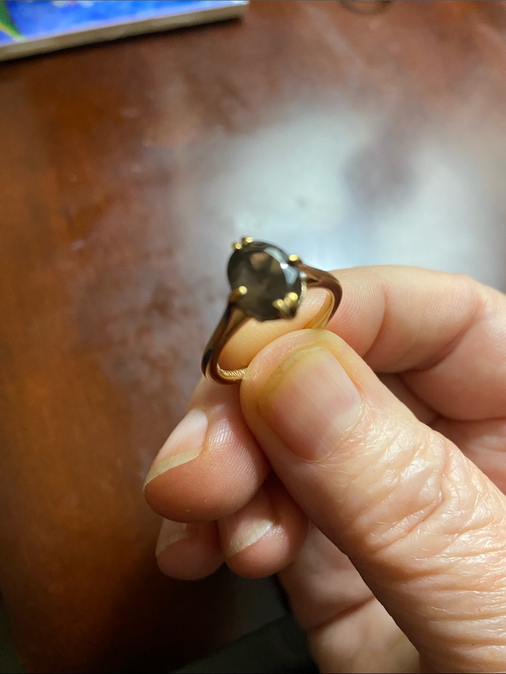 Gold-Tone Women's Ring with Dark Amethyst Oval Stone